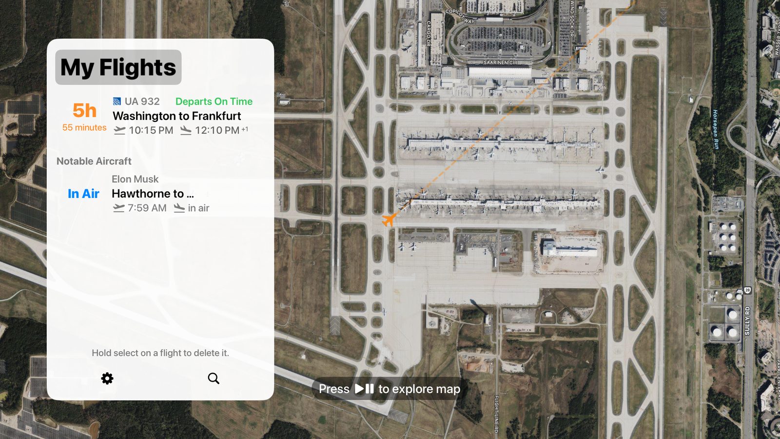 FlighTV on Apple TV showing a tracked flight at the gate at Washington Dulles